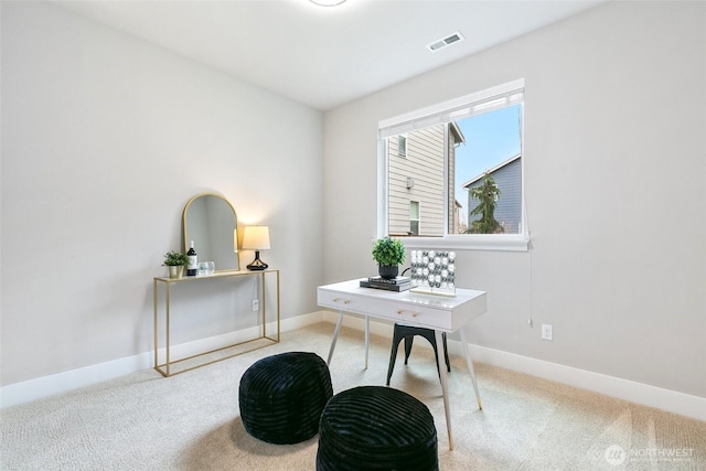 office with baseboards, visible vents, and carpet flooring