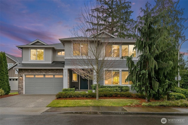 view of front of house featuring a garage and driveway