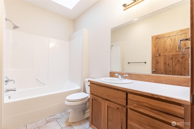 full bathroom featuring toilet, vanity, shower / bathtub combination, and a skylight