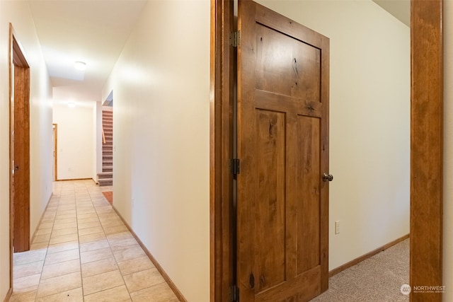 hallway with light tile patterned flooring