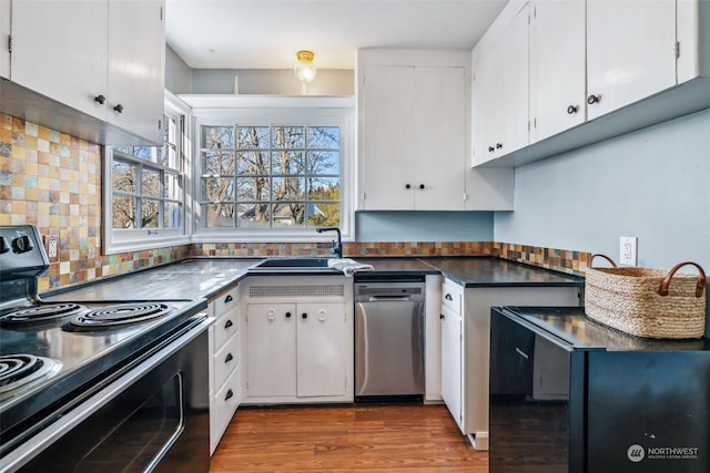 kitchen featuring dark hardwood / wood-style floors, dishwasher, sink, white cabinets, and electric range