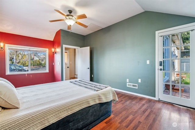 bedroom with vaulted ceiling, dark hardwood / wood-style floors, and ceiling fan