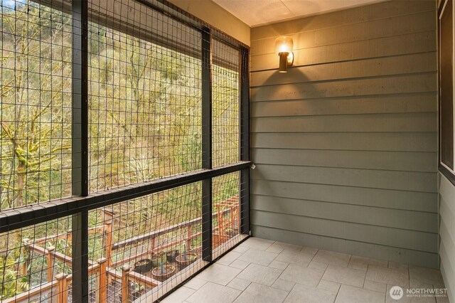 view of unfurnished sunroom