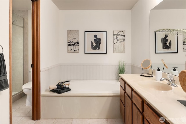 full bath featuring vanity, toilet, tile patterned flooring, a shower stall, and a bath