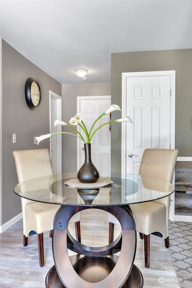 dining area featuring light hardwood / wood-style floors