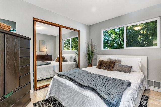 bedroom featuring light hardwood / wood-style floors