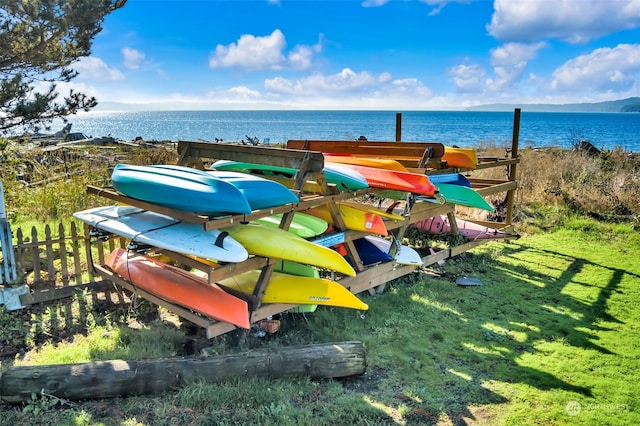 surrounding community with a water view