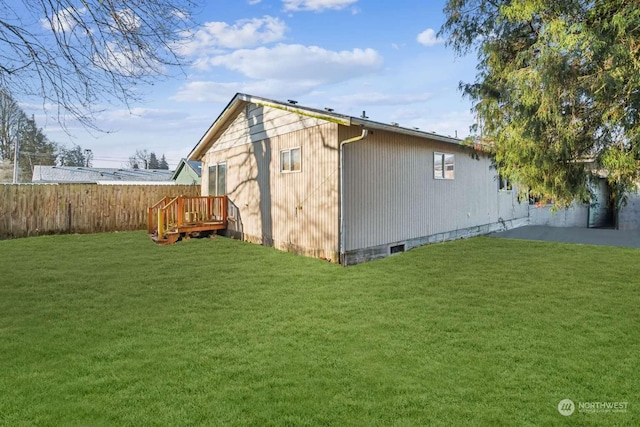 rear view of house with a yard