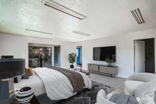 bedroom featuring a textured ceiling