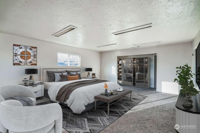 carpeted bedroom with a textured ceiling