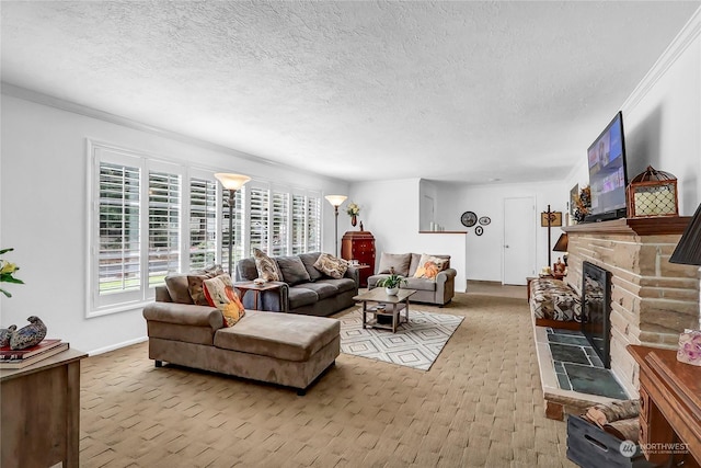 living room featuring ornamental molding, a brick fireplace, and a textured ceiling