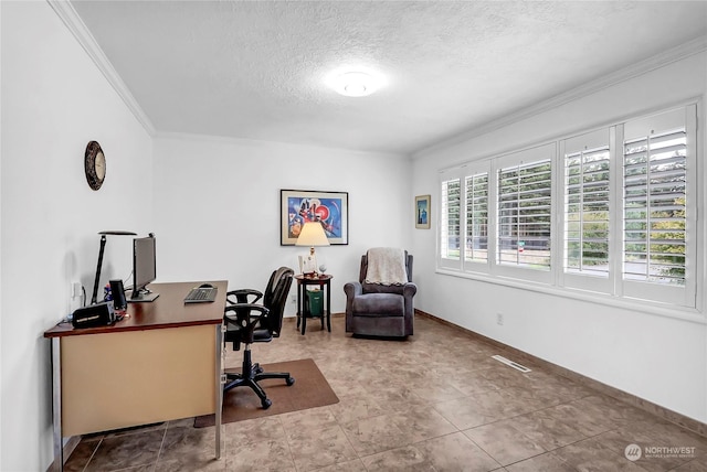 office space with ornamental molding and a textured ceiling