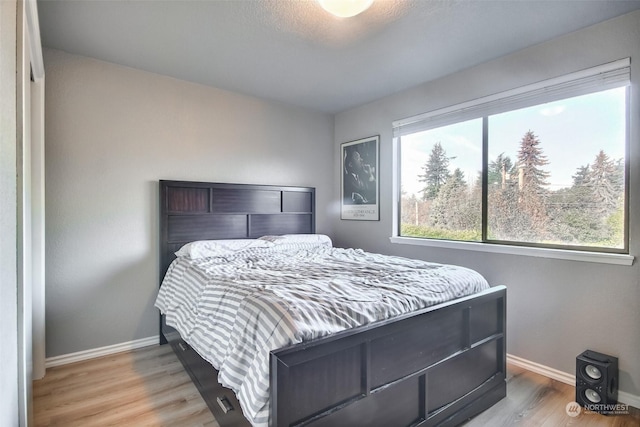 bedroom featuring light hardwood / wood-style flooring