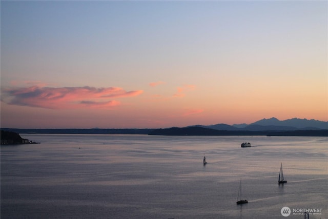 property view of water featuring a mountain view