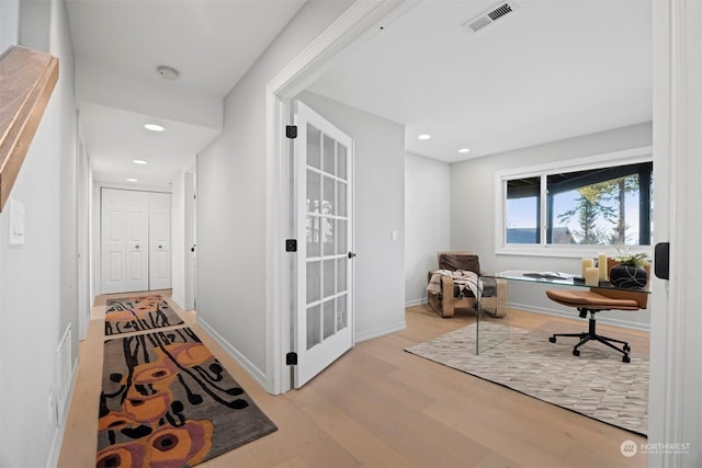 office featuring light hardwood / wood-style floors