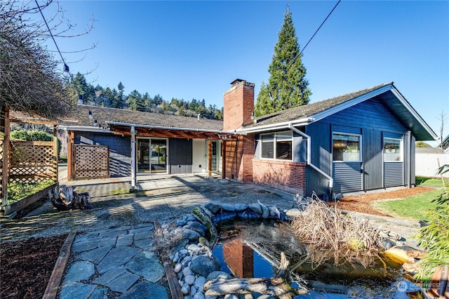 back of house featuring a patio area