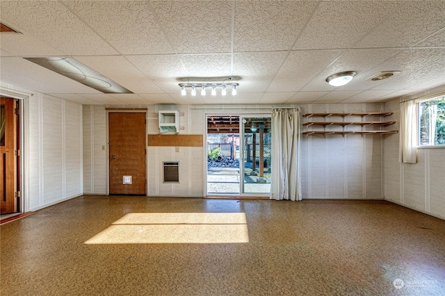 unfurnished room with a paneled ceiling