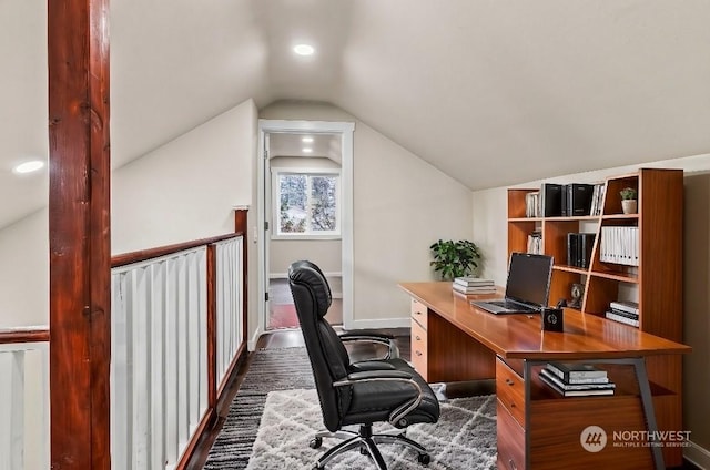 office space with vaulted ceiling