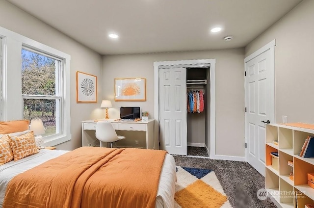 bedroom featuring dark carpet and a closet