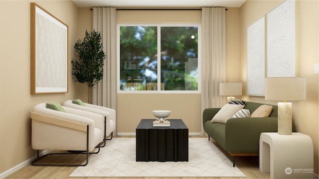 sitting room with light wood-type flooring