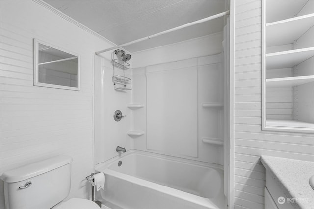 full bathroom with vanity, a textured ceiling, bathtub / shower combination, and toilet