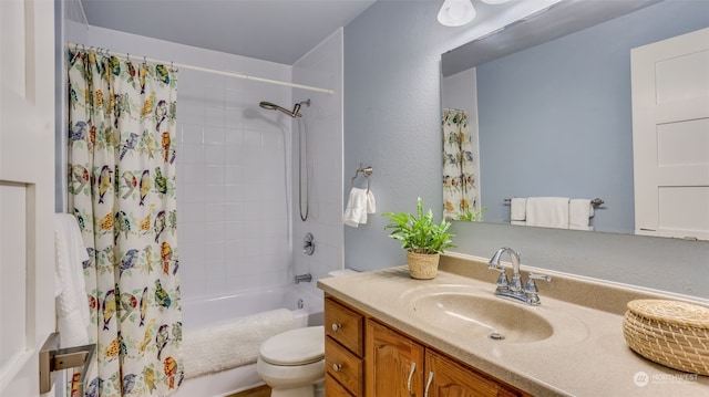 full bathroom with vanity, shower / bath combination with curtain, and toilet