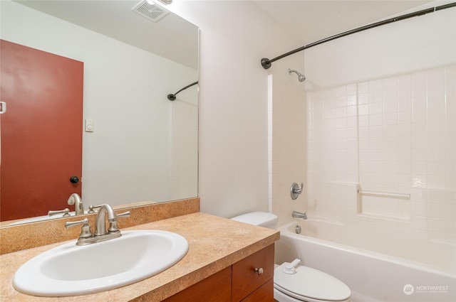 full bathroom with shower / bathing tub combination, vanity, and toilet