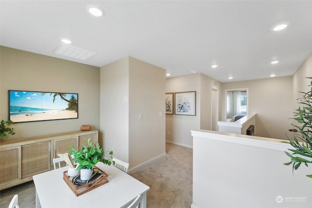 living room with light colored carpet