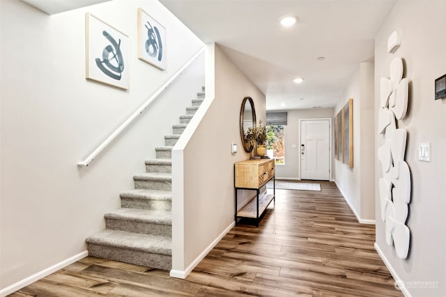 foyer entrance with wood-type flooring