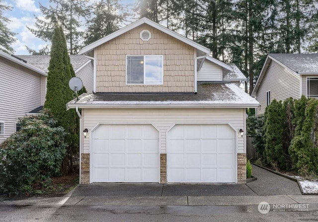 view of front of home featuring a garage