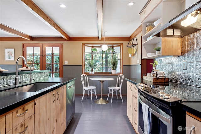 kitchen featuring sink, appliances with stainless steel finishes, dark hardwood / wood-style floors, extractor fan, and beamed ceiling