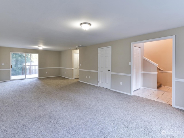 empty room with light colored carpet