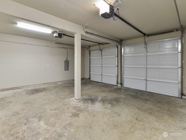 garage featuring a garage door opener and electric panel