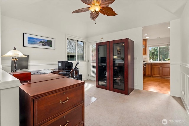 office space featuring a sink, light carpet, ceiling fan, and recessed lighting