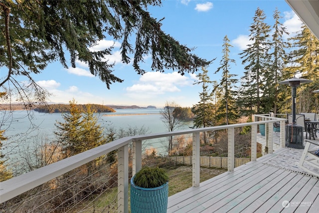 deck featuring a water view