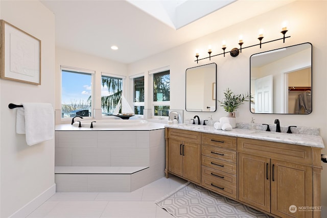 bathroom with vanity and tile patterned floors