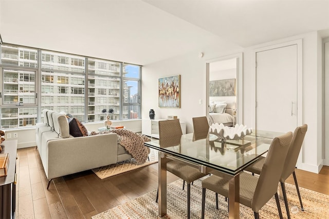 dining area featuring hardwood / wood-style floors