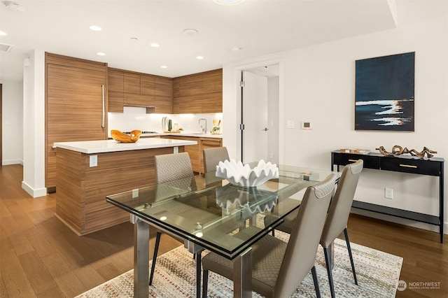 dining room featuring dark wood-type flooring