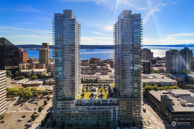 property's view of city featuring a water view