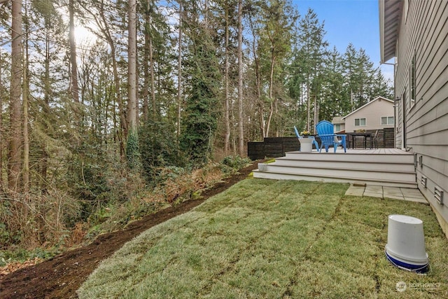 view of yard with a wooden deck