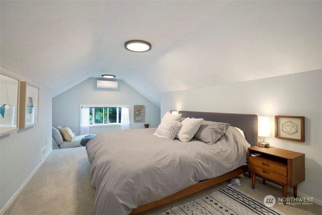 carpeted bedroom with lofted ceiling