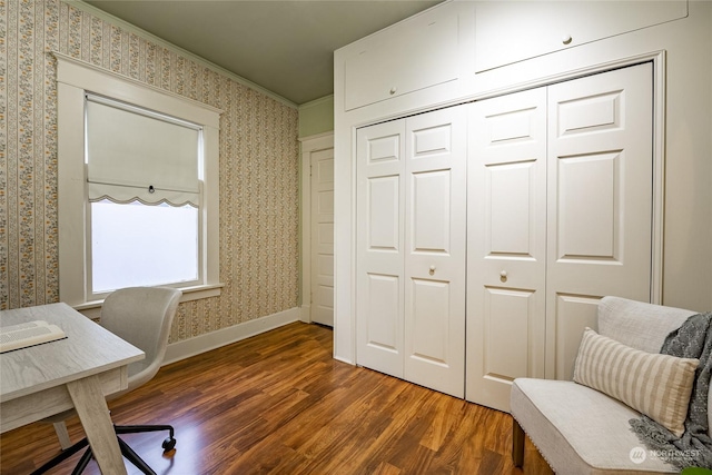 office area with ornamental molding and dark hardwood / wood-style floors