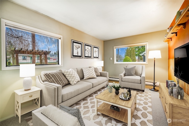 carpeted living room featuring baseboard heating