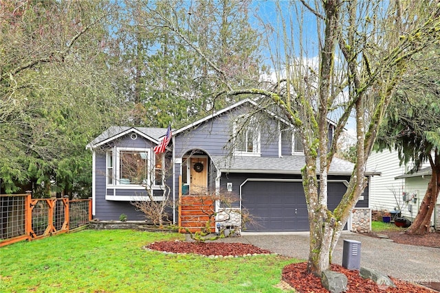 view of front of home featuring a front lawn, fence, aphalt driveway, stone siding, and an attached garage