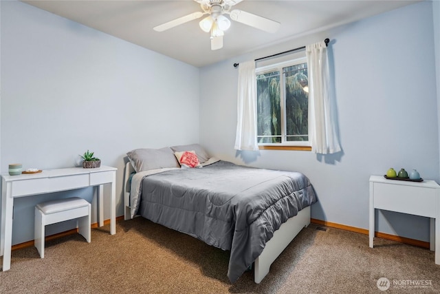 carpeted bedroom with baseboards and ceiling fan