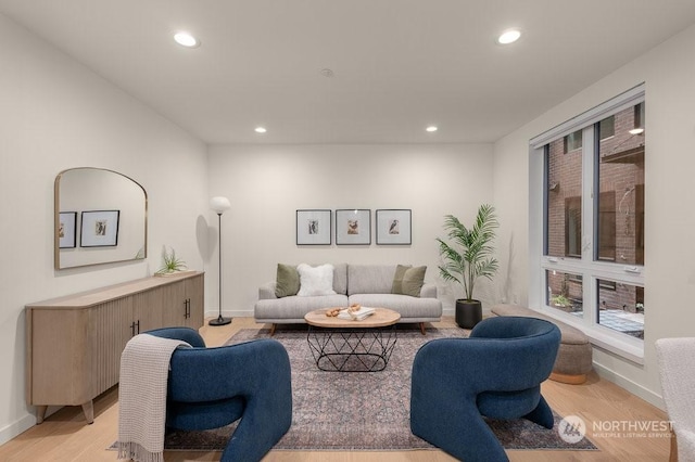 living room with light hardwood / wood-style floors