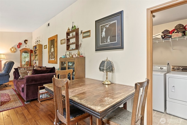220 California St, Pe Ell, WA 98572 - dining space with washing machine and clothes dryer and wood finished floors