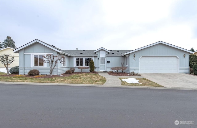 single story home featuring a garage