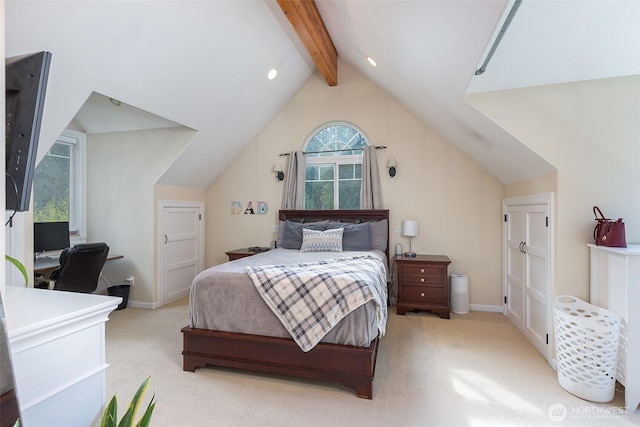 carpeted bedroom featuring vaulted ceiling with beams and baseboards