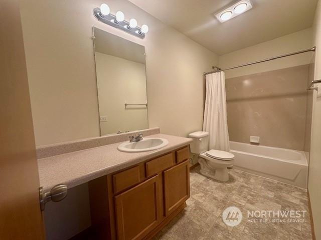 full bathroom featuring vanity, toilet, and shower / tub combo